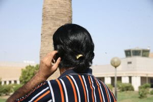 Even though Arab men tend to use their hands more expressively than Westerners, Rahim, here and the photo that follows, shows how his particular hand movements, along with his long hair, can mark him as gay to strangers. | MICHAEL T. LUONGO