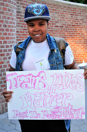 An August 28 vigil participant who identified herself as Naye delivered the evening message. | DONNA ACETO