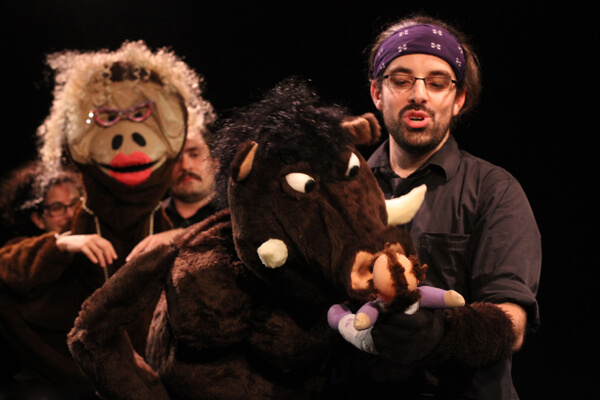 Puppet Shakespeare Players’ artistic director A. J. Coté with some of his fellow actors in “Puppet Titus Andronicus.” | DALE HELLER 