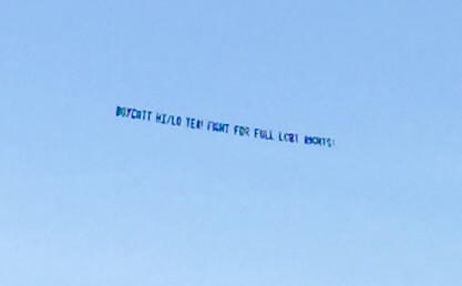 The banner Queer Nation flew over the beaches of the Fire Island Pines and Cherry Grove on June 7.