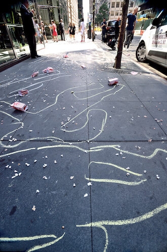 Chalk outlines representing the Aurora, Colorado, shooting victims. | DONNA ACETO 