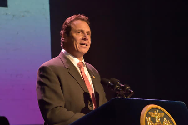 Governor Andrew Cuomo addressing a 2015 World AIDS Day event at the Apollo Theater in Harlem. | DONNA ACETO 