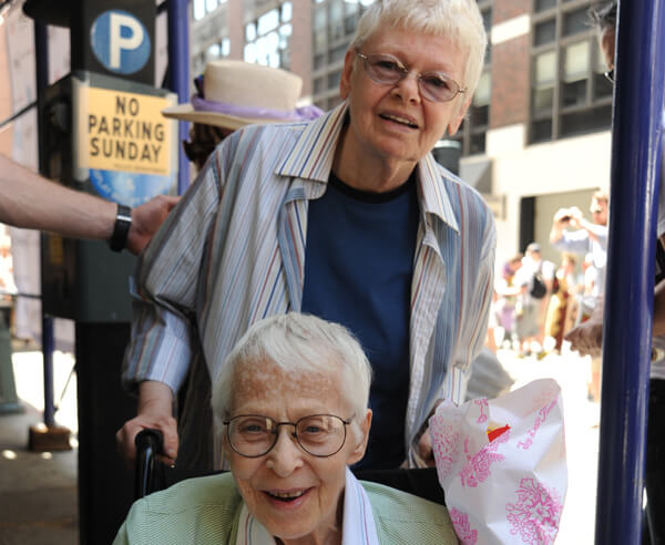 Connie Kopelov seated and Phyllis Siegel