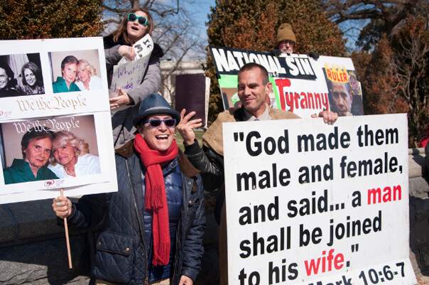 Lisa Cannistraci at home in her West Village bar and going toe-to-toe with an anti-gay protester outside the Supreme Court this past March.