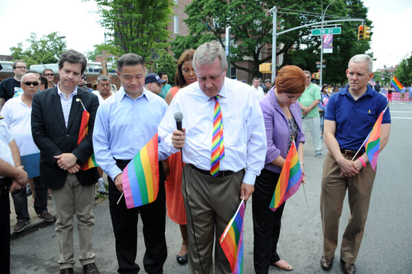 At the June 2, Queens LGBT Pride Parade, elected officials, including State Senator Brad Hoylman, Comptroller John Liu, and Councilmembers Letitia James, Daniel Dromm, Christine Quinn, and Jimmy Van Bramer, paused for a moment of silence to commemorate the recent victims of anti-gay violence. | DONNA ACETO 