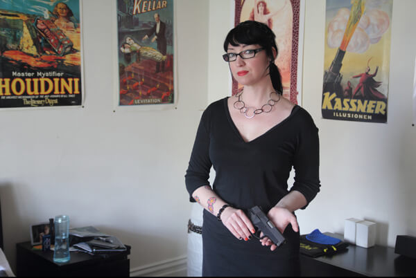 Violet Blue with her gun in her San Francisco apartment. | FIRST RUN FEATURES 