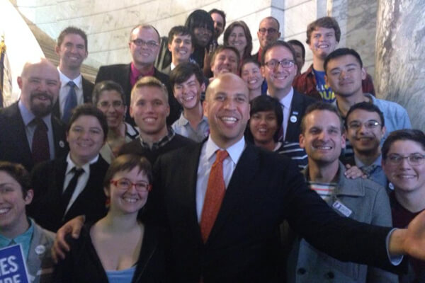 Newark Mayor Cory Booker, New Jersey's senator-elect, gathers with gay and lesbian couples at City Hall at midnight on October 21. | NEW JERSEY UNITED FOR MARRIAGE