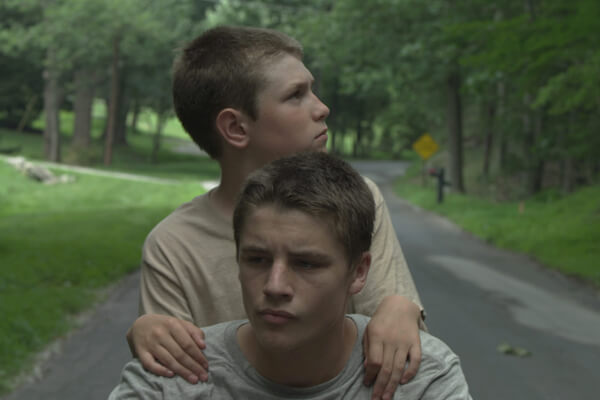 Nathan Varnson (foreground) and Ryan Jones in Daniel Patrick Carbone’s “Hide Your Smiling Faces.” | TRIBECA FILMS 