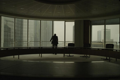 Financier Rainer Voss looks out on the skyscrapers of Frankfurt’s financial district. | AUTLOOK FILMS  