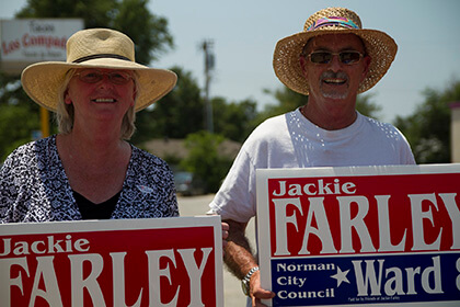 Nancy Harrington and her husband, Van, campaign for an out gay City Council candidate. | BROKEN HEART LAND