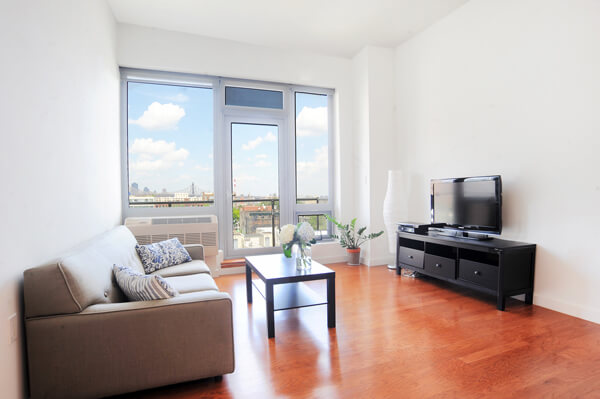 The living room of a one-bedroom condo at 5-49 Borden Avenue. | TOWN RESIDENTIAL