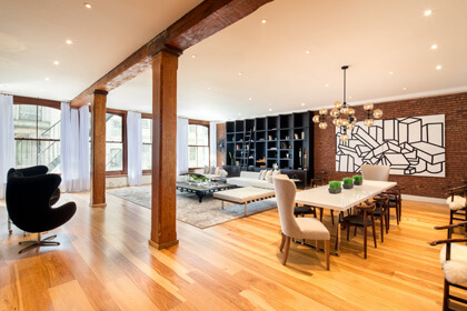 The living and dining space of a 4,500-square-foot loft at 88 Franklin Street. | PLATINUMPROPERTIESNYC.COM 