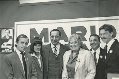 Mario Cuomo, during his 1982 run for governor, with Allen Roskoff, Betty Santoro, Bella Abzug, Ermanno Stingo, and Andy Humm. All but Abzug, a former member of Congress, were affiliated with the Coalition for Lesbian and Gay Rights.  | STEVE ZIFFER 