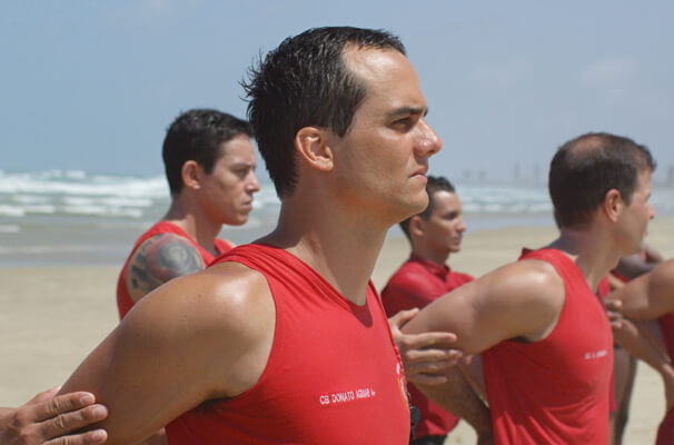 Wagner Moura (center) in Karim Aïnouz’s “Futuro Beach.” | STRAND RELEASING