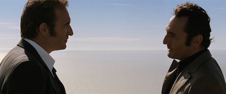 Jean Dujardin and Gilles Lellouche face off in Cédric Jimenez’s “The Connection.” | DRAFTHOUSE FILMS 