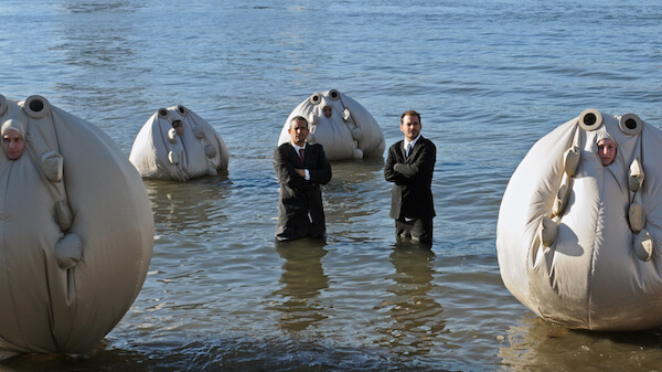 Mike Bonanno and Andy Bichlbaum in “The Yes Men Are Revolting,” which they co-directed with Laura Nix. | THE ORCHARD