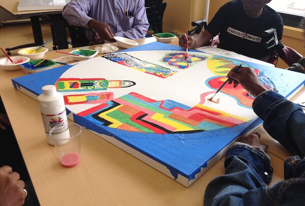 A mandala painting project is one of the activities offered by the SAGEDay program. | COURTESY: SAGE 