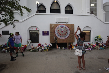 Memorial tributes left outside the Emanuel African Methodist Episcopal Church, known as Mother Emanuel. | MICHAEL LUONGO