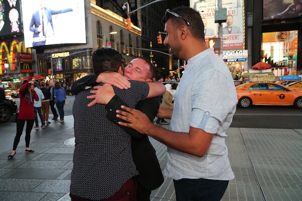 Nayyef Hrebid.JPG Michael Failla gives Btoo Allami a goodbye hug in Times Square, as Nayyef Hrebid looks on. | MICHAEL LUONGO 