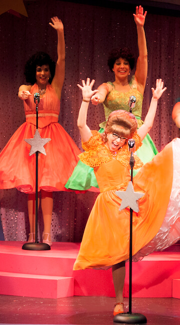 USE BYRNE wonderettes bianco.jpg Christina Bianco in a spotlight number, backed by Jenna Leigh Green and Sally Schwab. | THEMARVELOUSWONDERETTES.COM 