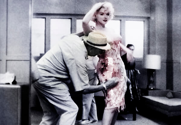 Orry-Kelly dressing Marilyn Monroe. | COURTESY: WOLFE VIDEO