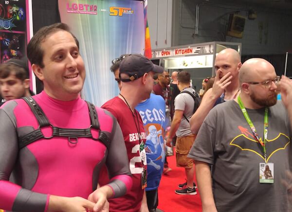 LGBT HQ director Matthew Levine (left) manning the booth at this year’s New York Comic Con. | RYAN KERR 