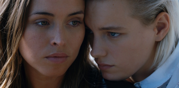 Natalie Krill and Erika Linder in April Mullen’s “Below Her Mouth.” | GUNPOWDER & SKY DISTRIBUTION 