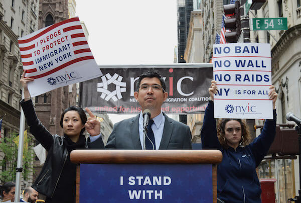 Out gay City Councilmember Carlos Menchaca of Brooklyn speaks to immigration rights advocates assembled several blocks below Trump Tower. | JACKSON CHEN